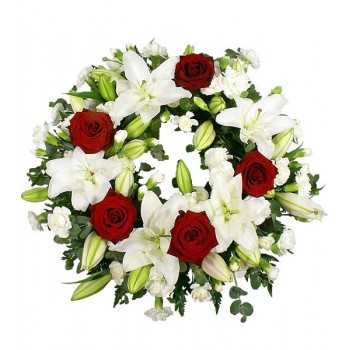 1 Corona Fúnebre, 5 Liliums, 5 Rosas y Maule