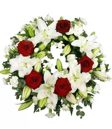 Corona fúnebre con 5 liliums, 5 rosas y maules